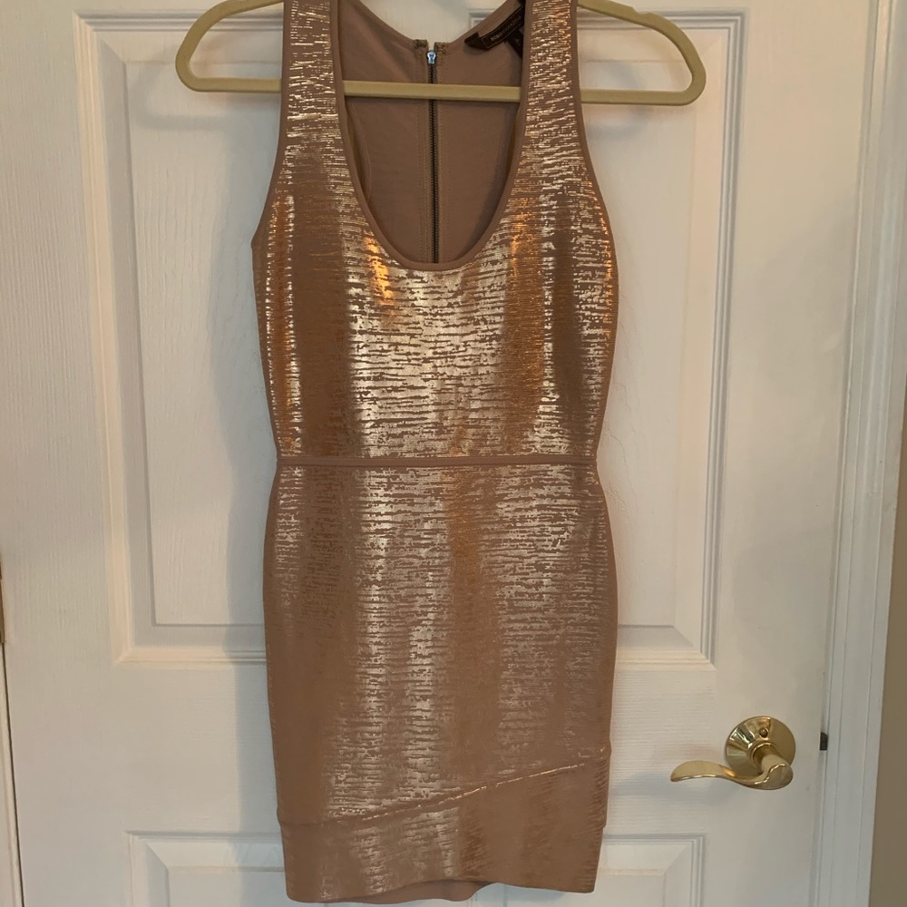 BCBG MaxAzria rose gold bandage dress.